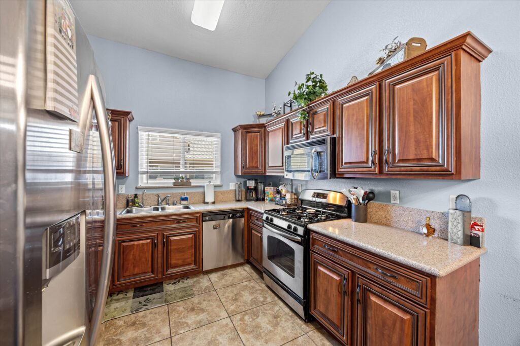 Kitchen in downsizing condo in Las Vegas with stainless appliances