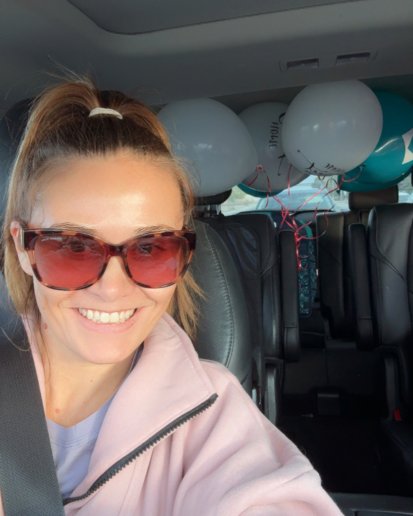 Allison Miller delivering a welcome home gift to a Las Vegas home buyer